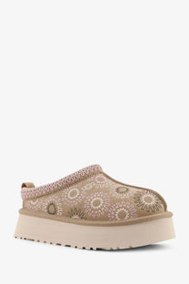 UGG women’s Tazz suede beige slip-on mule with embroidered floral pattern and pink stitching