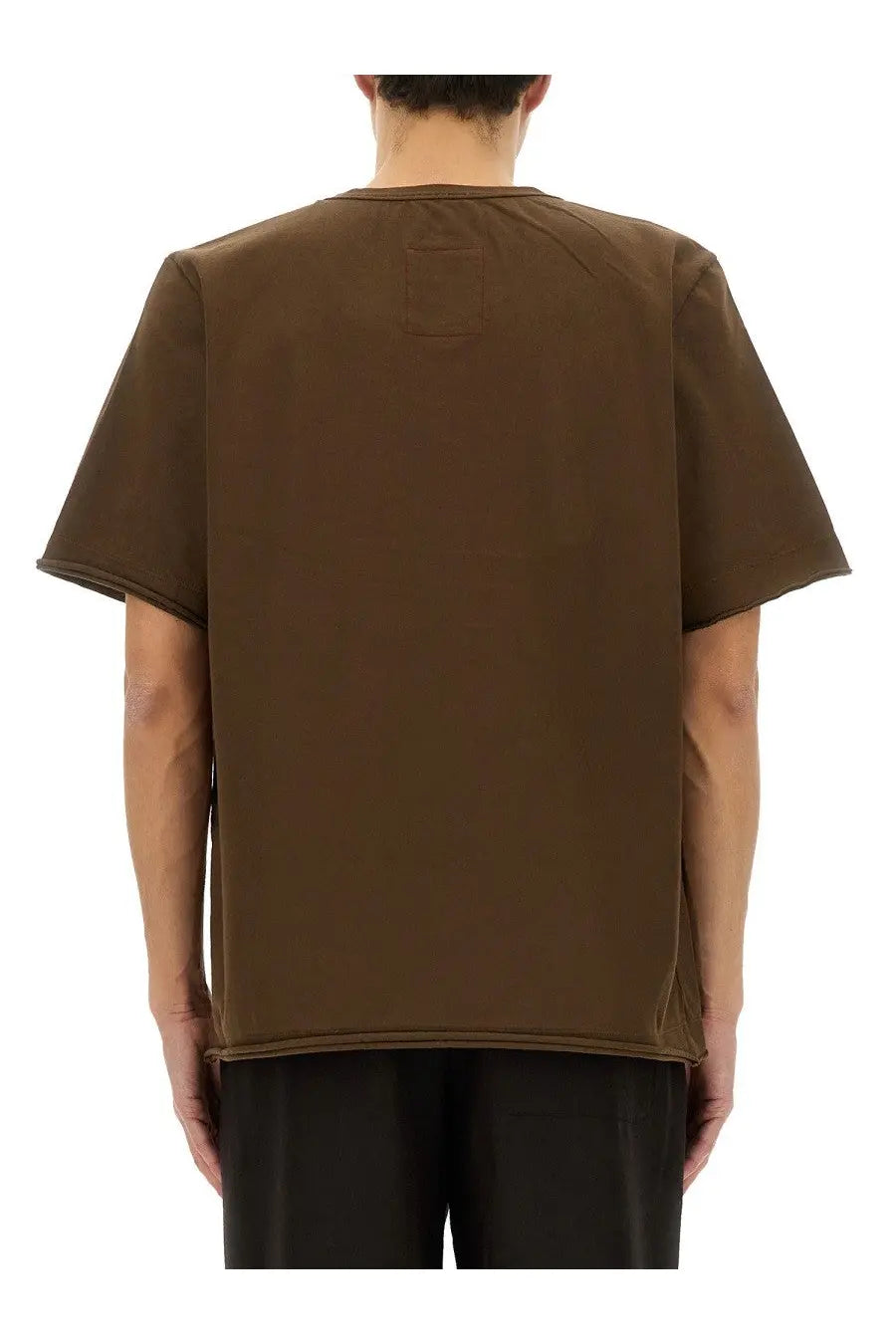 Back view of uma wang men’s brown cotton short-sleeved t-shirt with a subtle square patch on the back