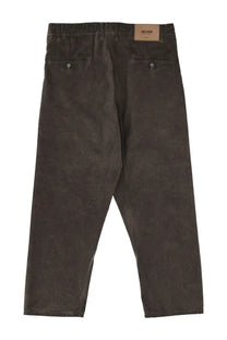 Dark olive green waxed cotton relaxed fit trousers with buttoned back pockets showing the back side