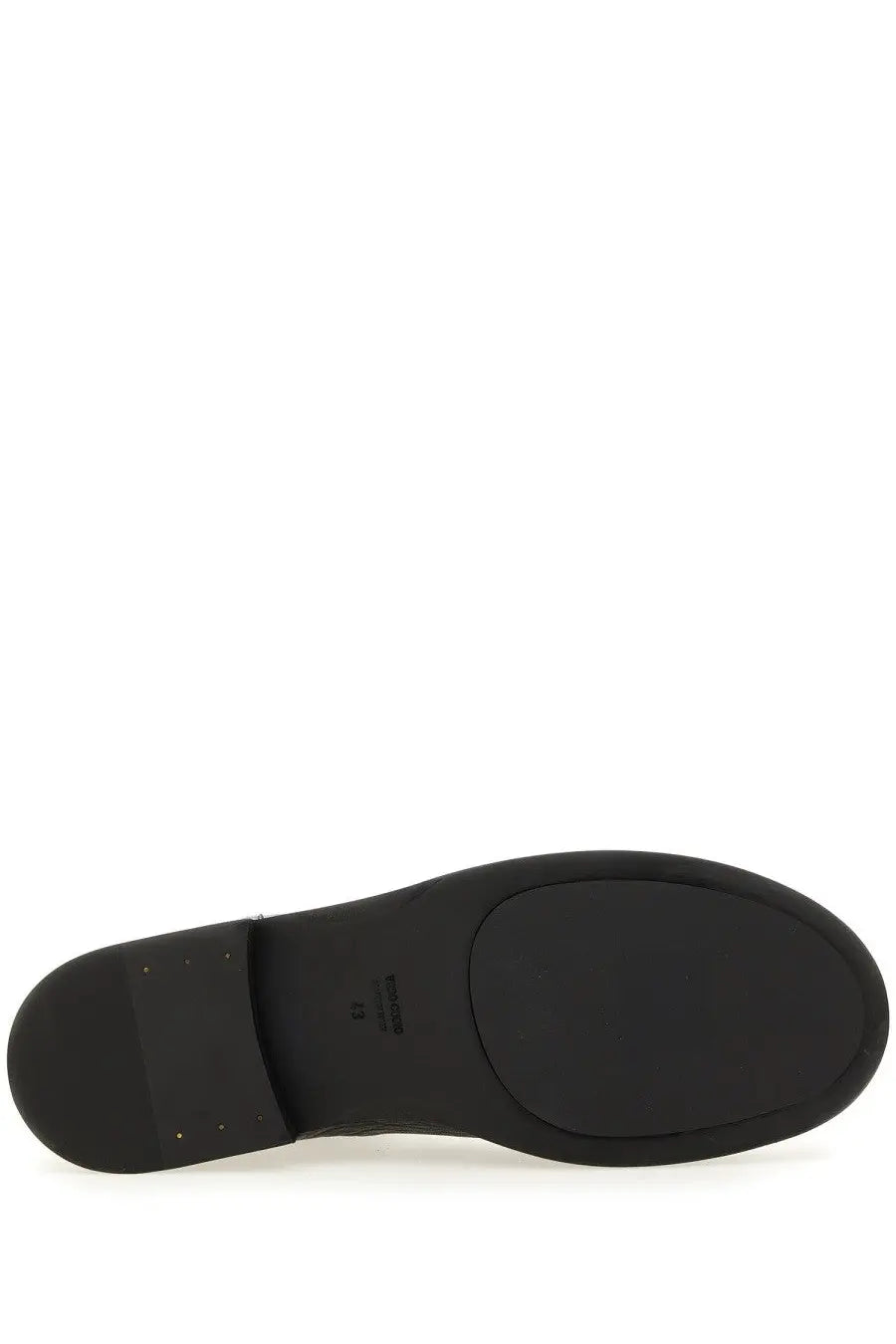 Black rubber sole with minimalist design and subtle branding on the back of uma wang men’s leather boot black