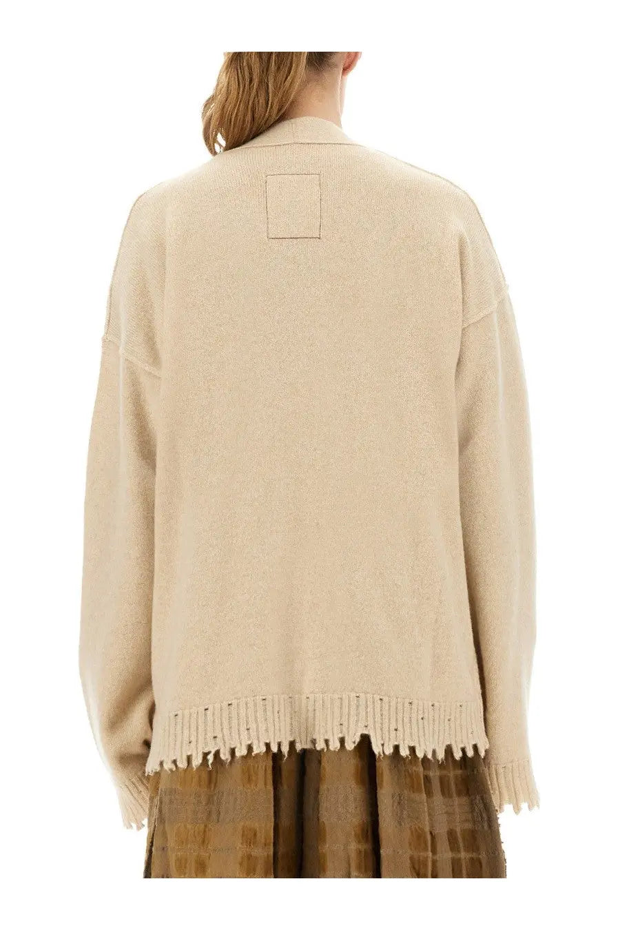Back view of uma wang women’s beige cashmere knit cardigan with frayed hem and square patch detailing