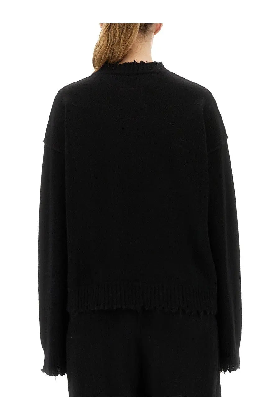 Uma Wang women’s cashmere sweater in black with knit texture and frayed hem and cuffs detail