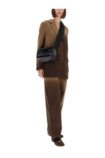 Black glossy crossbody bag with structured rectangular shape and single shoulder strap in uma wang women’s jacket jane multicolor collection