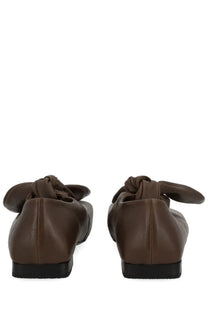 Back view of uma wang women’s grey leather lace up shoe with brown leather flats knotted bow detail at the back