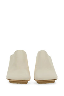 Cream-colored suede Uma Wang women’s leather mule with low block heel and slip-on design