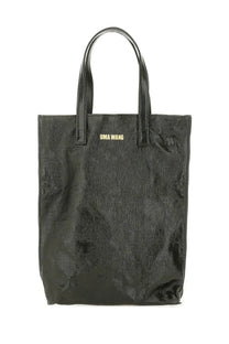 Black uma wang medium tote bag made of glossy textured material with gold-tone branding on the front