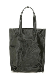 Black glossy vinyl tote bag with structured handles from uma wang womens medium tote bag collection in green