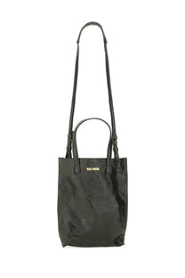 Black textured miu miu tote bag with long shoulder strap and gold logo on front for everyday use