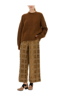 A cozy brown wool blend sweater by Uma Wang with textured knit, round neckline, and long sleeves for women