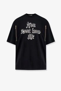 Undercover men’s black oversized cotton t-shirt with white gothic you dont know me text and gold sleeve zippers