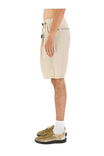 Undercover men’s beige linen shorts with drawstring waist and zipper pocket for casual summer wear
