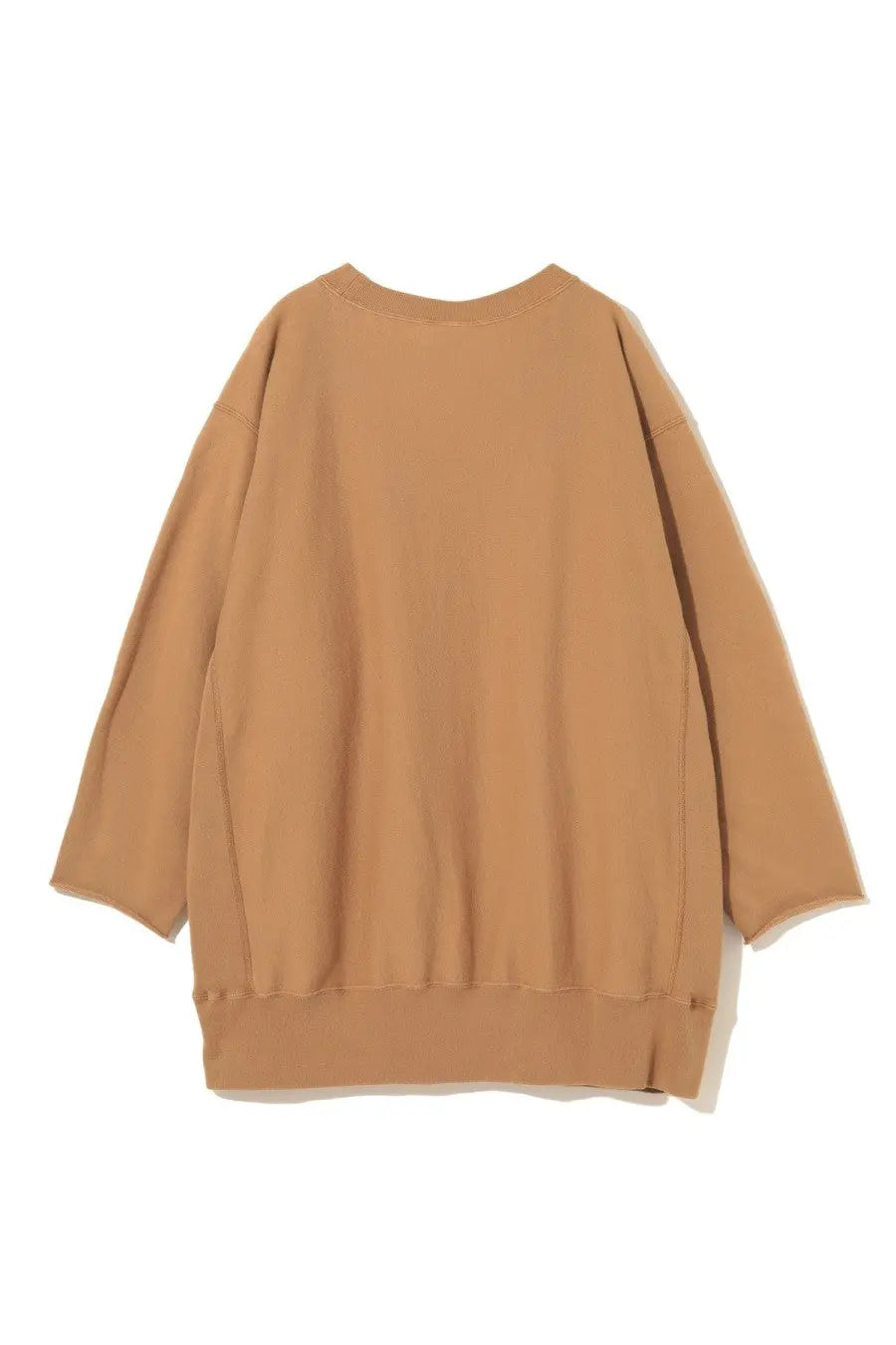 Tan oversized unisex Champion undercover sweatshirt with relaxed fit and ribbed cuffs in beige color