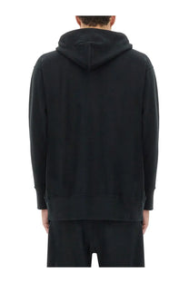 Black unisex champion undercover sweatshirt with relaxed fit and ribbed cuffs in a hooded design