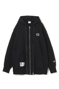 Black champion zip-up hoodie with embroidered logos on chest and sleeve, front zipper, and side pockets undercover unisex sweatshirt
