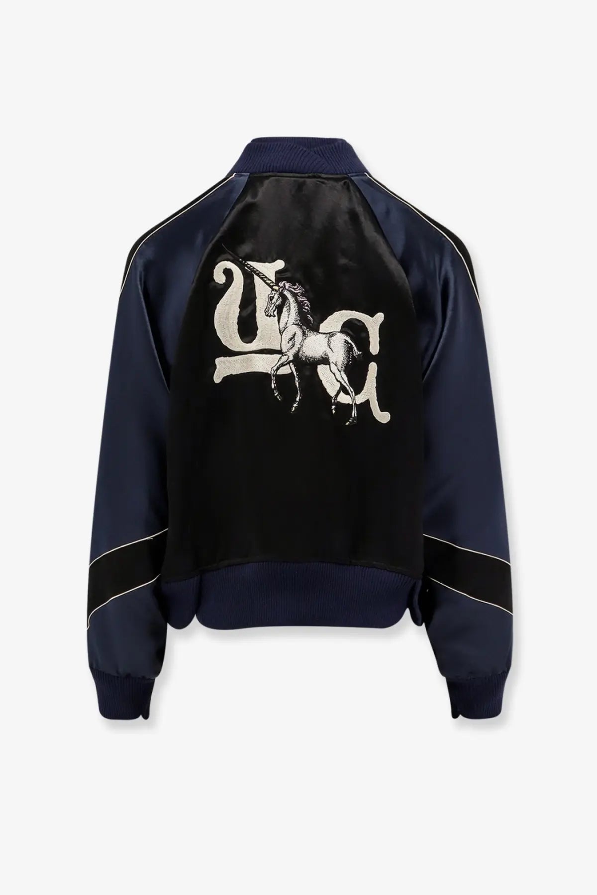 Navy blue satin Undercover women’s bomber jacket showing the back with white embroidered unicorn and ua lettering