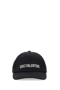 Valentino men’s black baseball cap with white embroidered chez valentino text on the front panel