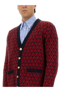 Valentino men’s red and black herringbone cardigan with navy trim and gold buttons for stylish layering