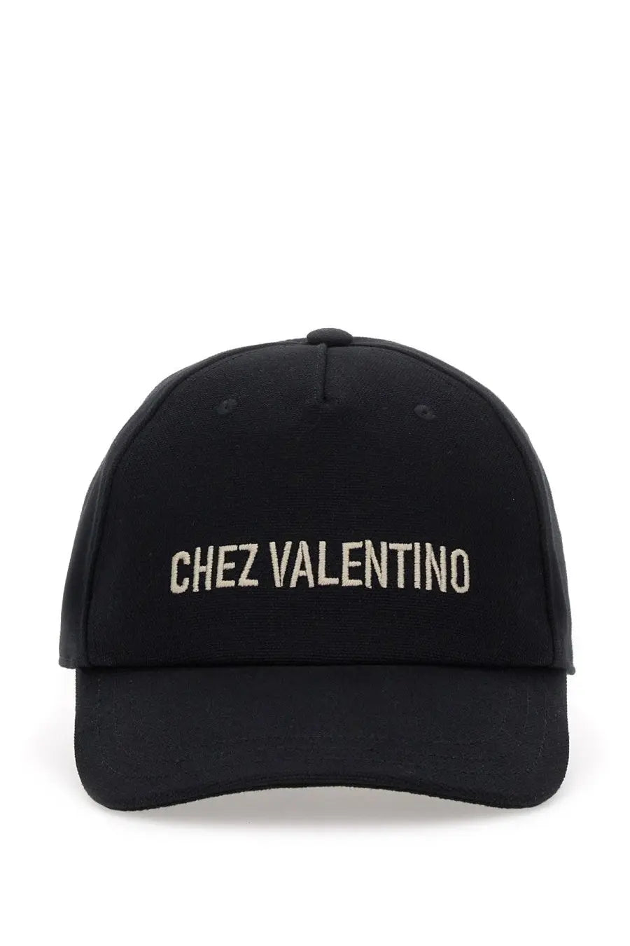 Black baseball cap with chez valentino embroidered in white thread across the front by Valentino men’s collection