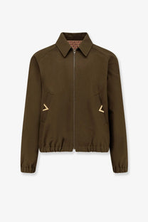 Valentino men’s olive green cotton bomber jacket with gold triangle pocket accents and patterned inner lining