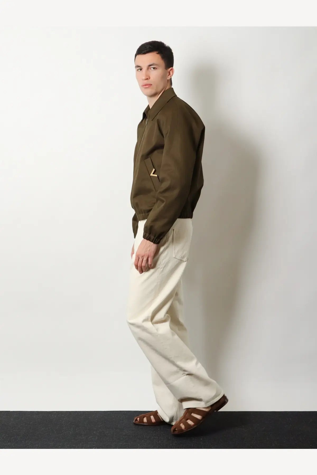 Valentino men’s olive green cotton bomber jacket with zipper closure and triangular stitching on chest pocket