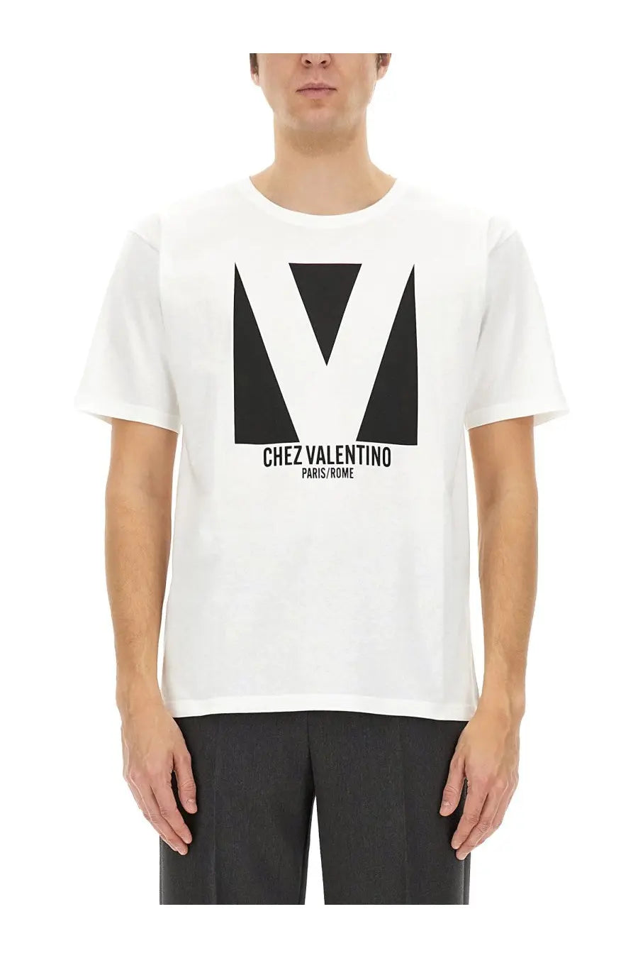 Valentino men’s white cotton shirt with bold black geometric v logo and chez valentino paris rome text below
