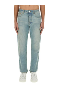 Valentino men’s light-wash denim jeans with straight-leg cut and classic five-pocket design in blue