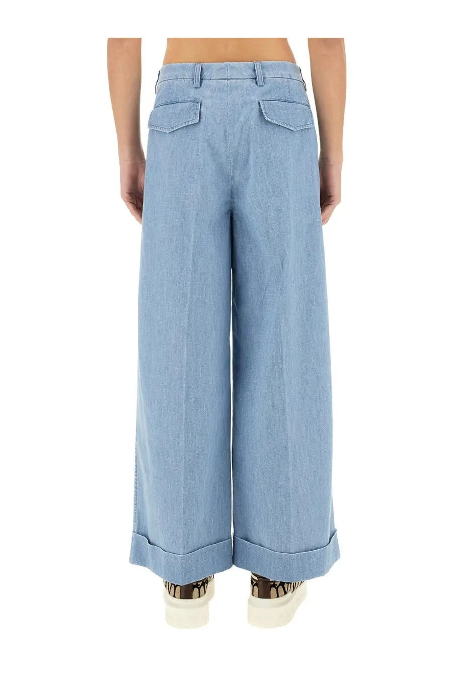Valentino men’s light blue denim wide-leg pants with rolled cuffs and front pockets designed for casual wear
