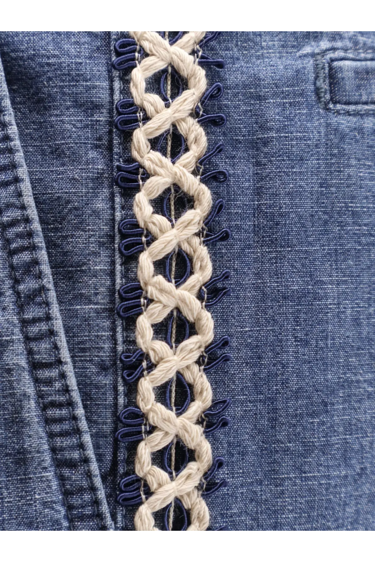 Beige braided cord with navy blue fabric loops on blue denim valentino men’s denim shorts front side