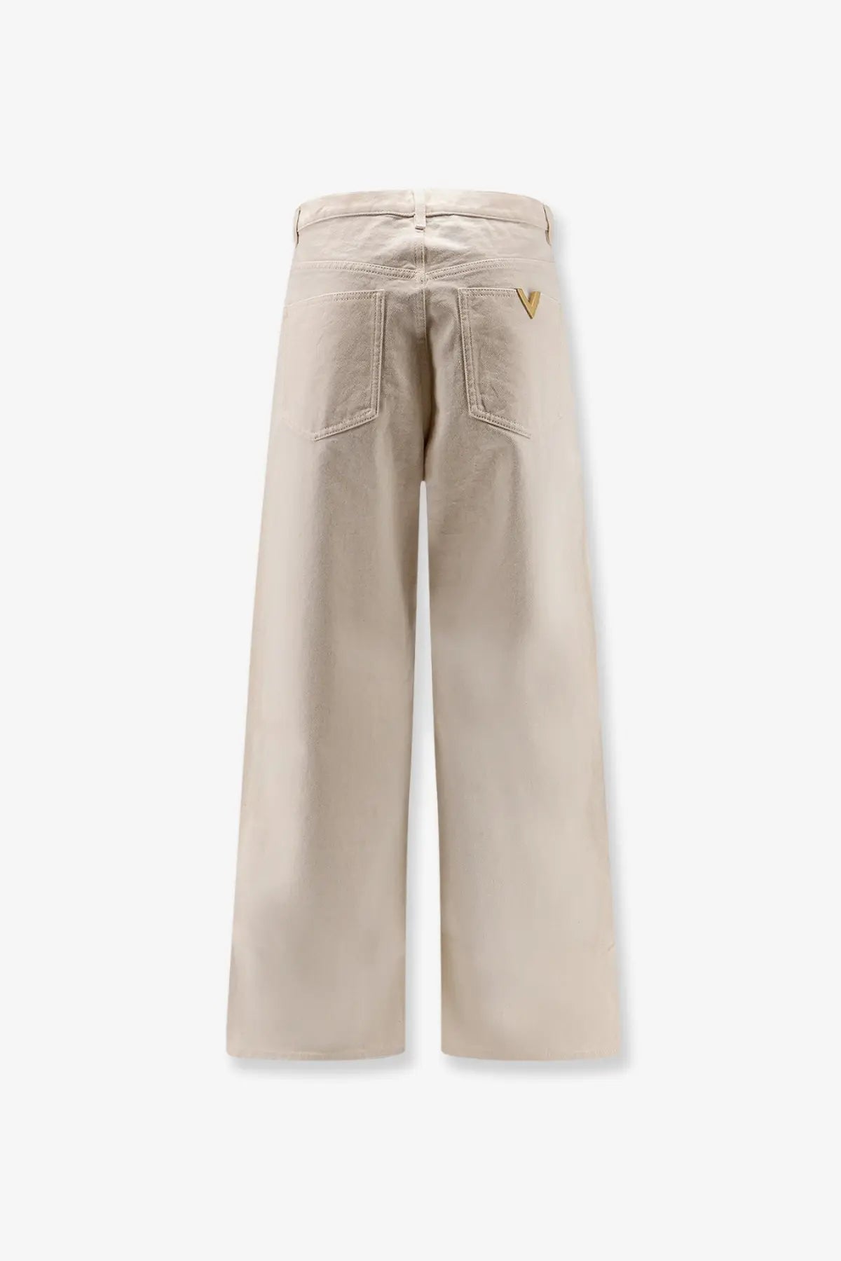 Beige wide-leg cotton denim trousers with subtle gold valentino logo on the back pocket showing the back side