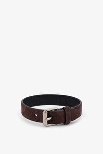 Brown suede belt with silver-toned buckle paired with valentino men’s leather bracelet gold in stylish combination