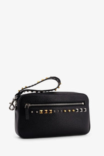 Valentino men’s black pebbled leather clutch with gold and silver pyramid studs and studded wrist strap