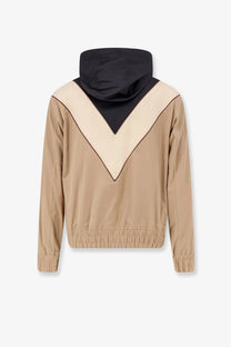 Valentino men’s black hooded jacket with beige and black bold v-shaped color block design for casual wear