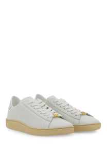 Valentino men’s white leather sneakers with gold-tone eyelets and beige rubber sole for casual wear