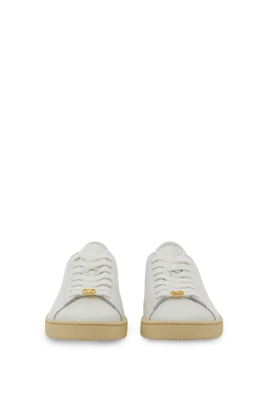 Valentino men’s white leather sneakers with gold-tone metal eyelets and beige rubber sole