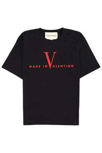Black valentino men’s t-shirt featuring bold red v and made in valentino lettering on the chest