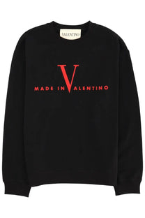 Black Valentino men’s sweatshirt featuring bold red v and made in Valentino lettering on the chest