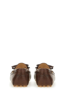 Valentino men’s moccasin vlogo signature brown leather loafers with tan soles and decorative metal eyelets