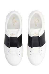 White valentino garavani men’s open sneaker with black leather straps and spiked detailing in white leather