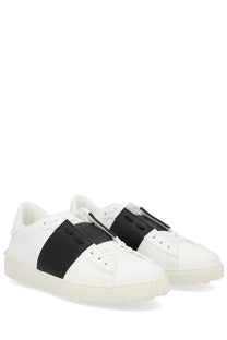 Valentino men’s open sneaker white with white leather and bold black strap across midfoot classic lacing minimalist design