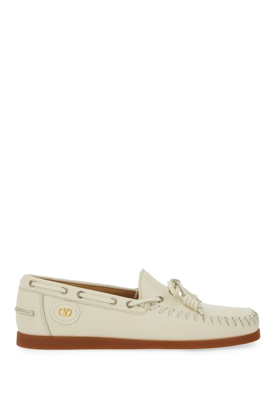 Cream-colored leather Valentino men’s Palm Avenue boat moccasin with braided tassel and stitched detailing