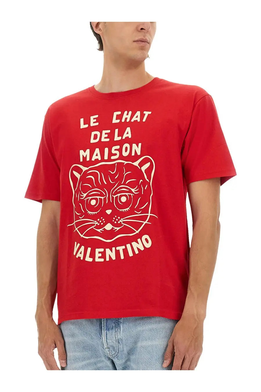 Valentino men’s red t-shirt featuring white line-art cat illustration with le chat de la maison text design
