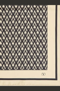 Valentino men’s silk scarf cream color with bold black zigzag pattern and matching border featuring logo embroidery