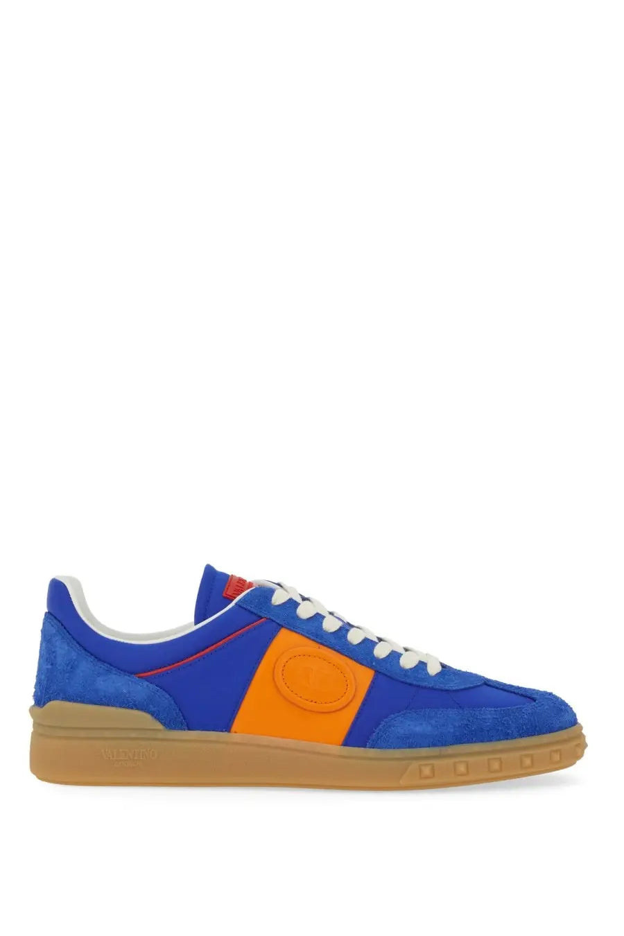 Valentino men’s low top sneaker in blue suede with bold orange panel white laces and gum rubber sole