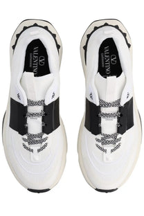 Valentino men’s sneaker true act white with white and black mesh upper, chunky sole, and bold contrast stripes