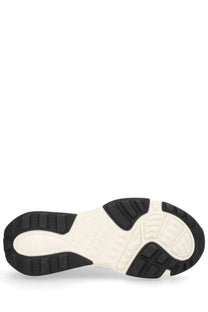 Black and white rubber sole with textured tread pattern on valentino men’s sneaker true act white