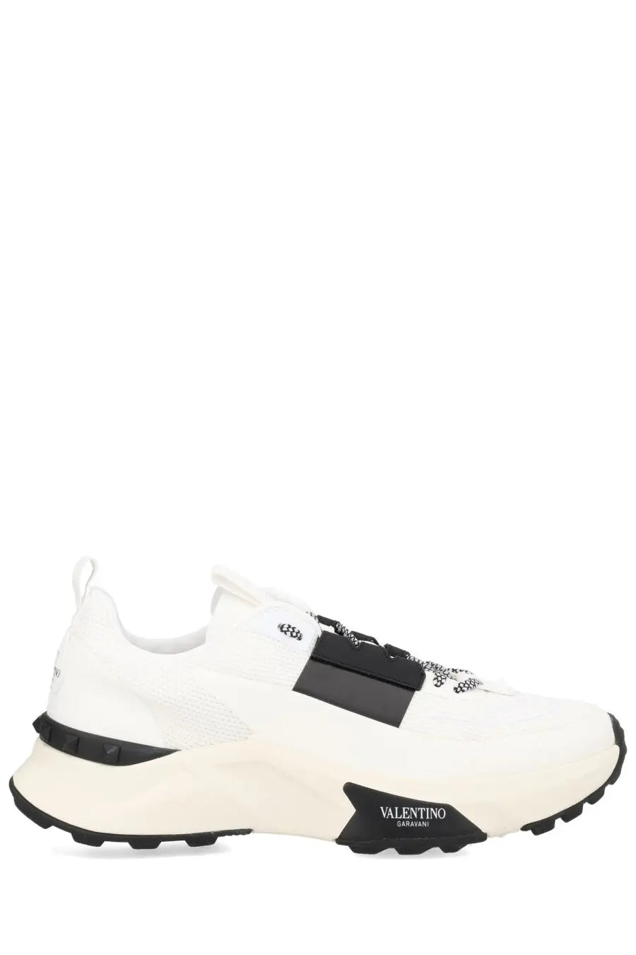 Valentino men’s sneaker true act white with black accents and textured details in leather and mesh materials