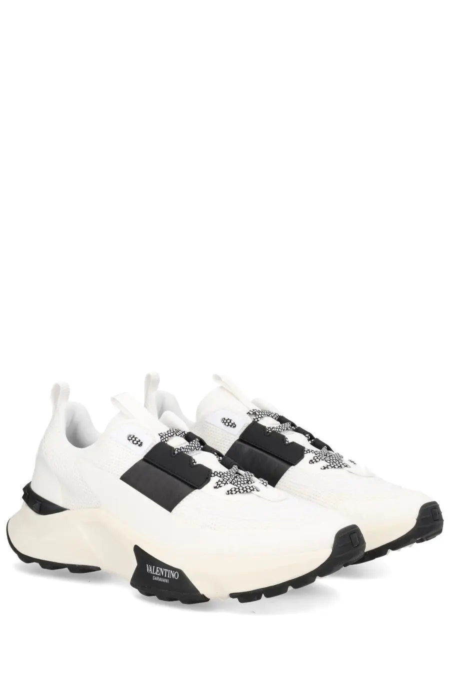 Valentino men’s sneaker true act white featuring white leather with black accents and decorative stitching
