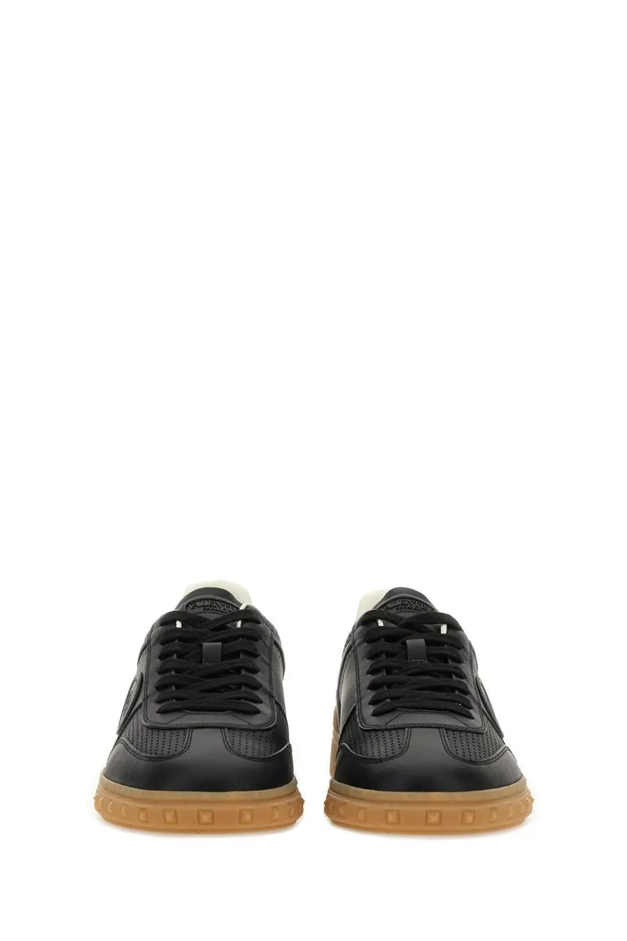 Valentino men’s upvillage sneaker black black leather with tan rubber sole and perforated detailing