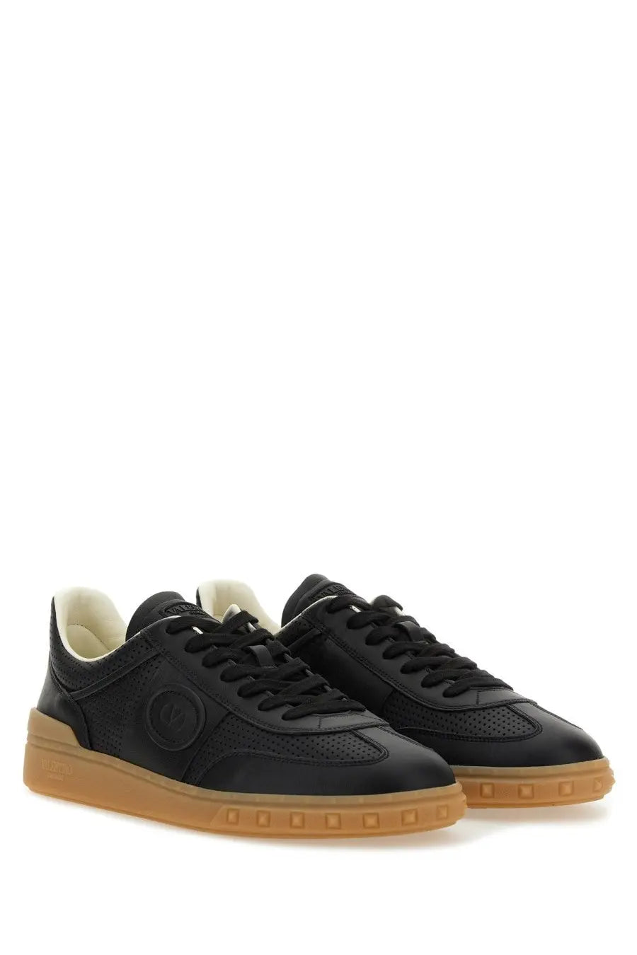 Valentino men’s upvillage sneaker black leather with tan rubber sole and perforated detailing