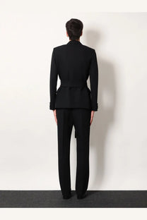 Valentino men’s black virgin wool blazer tailored with a cinched waist and structured shoulders in front view